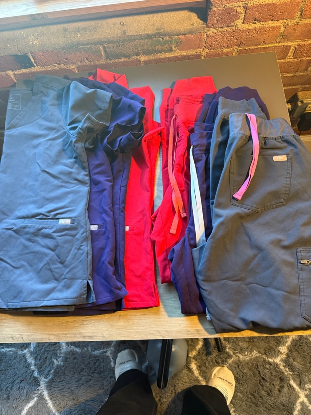 Figs Scrub Tops and Pants in Navy, Red, and Purple